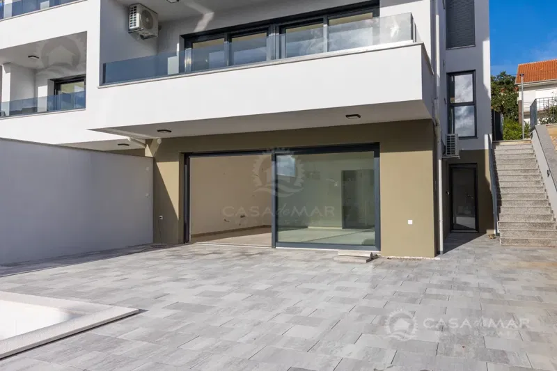 A beautiful two-story apartment with a garden in a new building – 2
