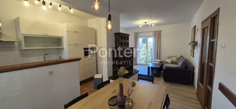 CRIKVENICA, we are selling two houses in a good location in a dead-end street. The first, larger house is used as an apartment for rent, it has its own yard with a barbecue. The apartment consists of a kitchen, dining room, living room with access to – 2