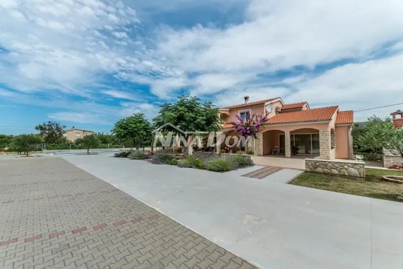 Residential and commercial building with a large garden and swimming pool – 2
