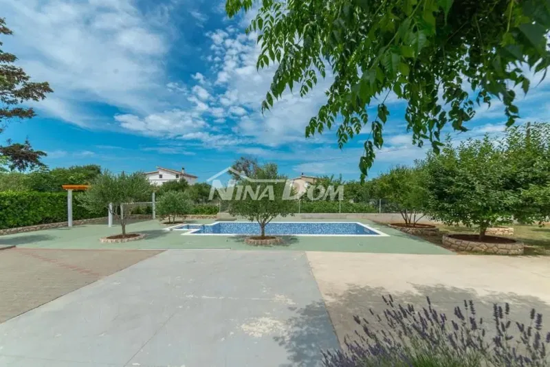 Residential and commercial building with a large garden and swimming pool – 3