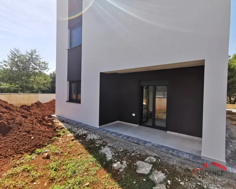 Medolino, nuova costruzione, appartamento al piano terra con giardino – 3