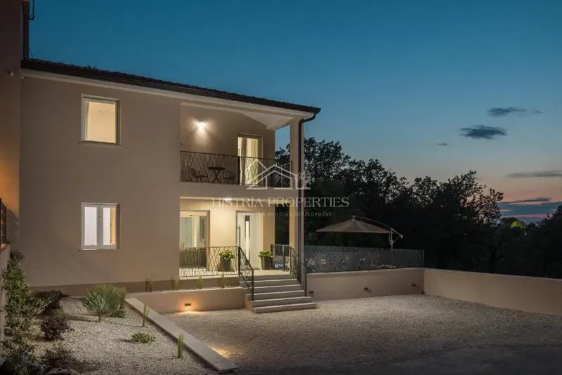 A semi-detached house with a pool surrounded by forest and nature – 2