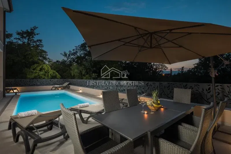 A semi-detached house with a pool surrounded by forest and nature – 3
