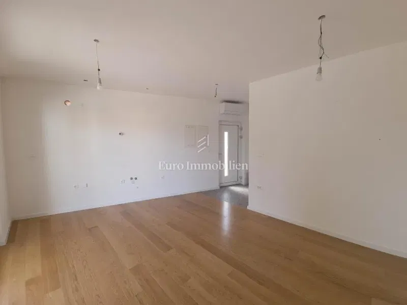 New ground-floor apartment with garden and garage – 2
