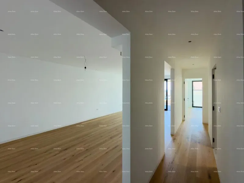 Sale of apartments in a residential-commercial building with a sea view, center of Umag! S3 – 3