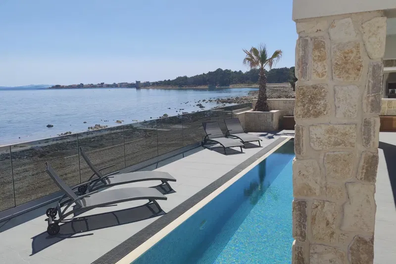 Villa with a Pool in the First Row to the Sea – 2