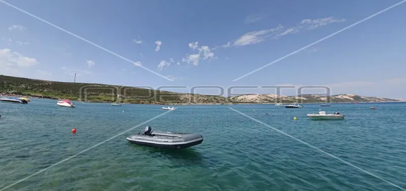 INVESTIMENTO, Terreno fronte mare, strada di accesso, Novalja, 12.440 m2 – 2