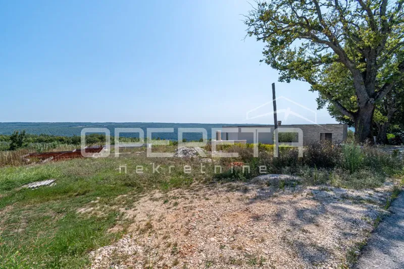 Istria, Krasica – attractive land with a project and commenced construction, sea view – 3