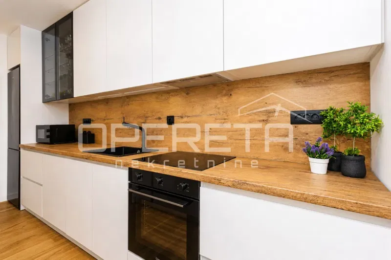 New construction with an elevator, garage, and large balcony – 3