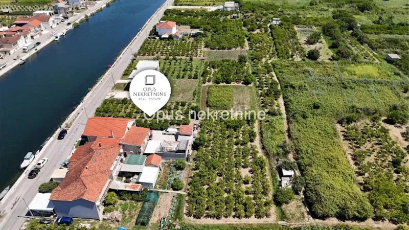 OPUZEN - VLAKA, SLIVNO - gradevinsko zemljiste 874 m2 s pogledom na rijeku