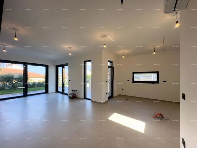 We are selling a semi-detached villa with a pool and a garage – 2
