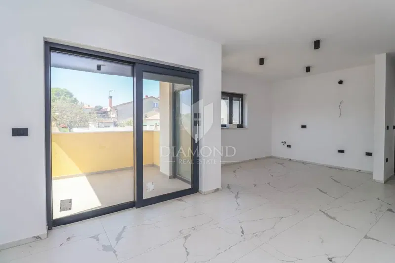 Attraente appartamento in un nuovo edificio di pregio con giardino e ascensore – Štinjan – 2