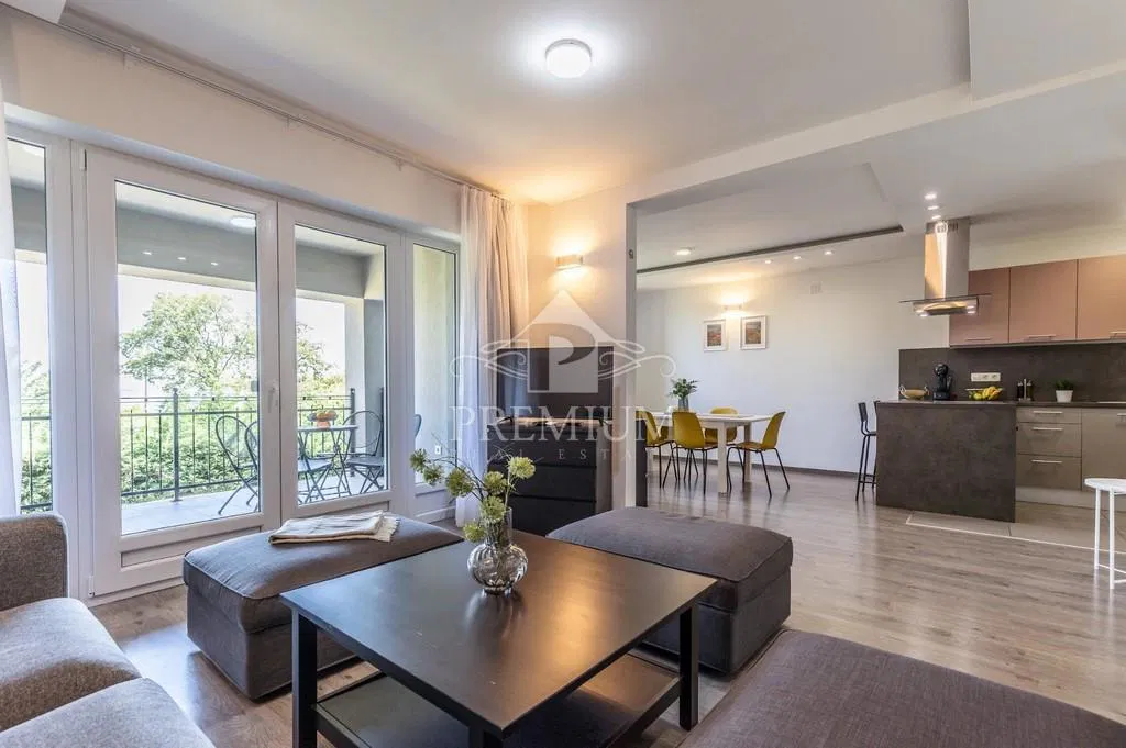 Erdgeschosswohnung in einem Neubau mit Meerblick